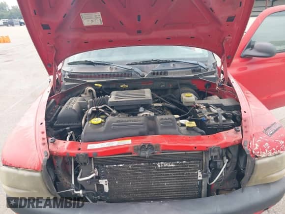 2003 Dodge Dakota Sport z VIN 1D7HG32N43S202783, wystawiony jako IAAI lot #42512950 z przebiegiem 217 105 mil mil oraz . Historia ofert i sprzedaży dostępna na DreamBid. Obrazek 10.