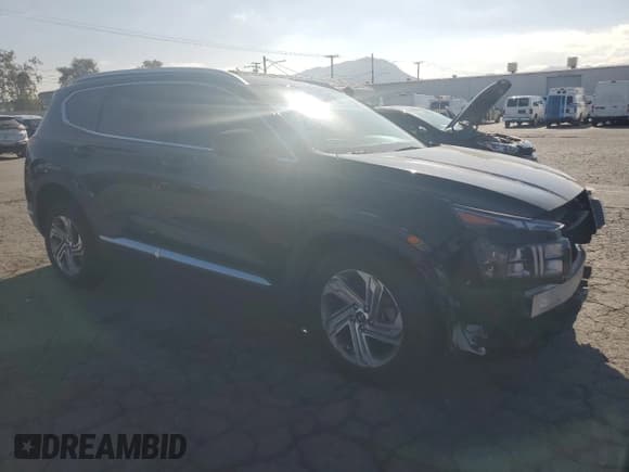 ✅ 2021 Hyundai Santa Fe SEL • VIN: 5NMS24AJ1MH334223 • Lot: 89676665. Listed on Copart with 33,629 mi. Free auction sales archive from the USA and detailed vehicle history report at DreamBid. Image 4.