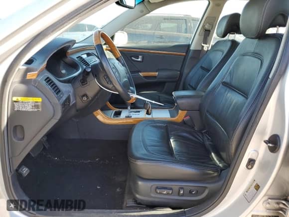 2007 Hyundai Azera SE z VIN KMHFC46F47A234162, wystawiony jako Copart lot #85822104 z przebiegiem 122 281 mil mil oraz Szkoda całkowita • Salvage title. Historia ofert i sprzedaży dostępna na DreamBid. Obrazek 7.