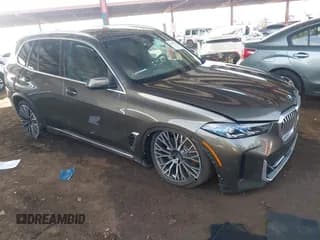 ✅ 2026 BMW X5 xDrive40i • VIN: 5UX23EU01T9048743 • Lot: 43710954. Listed on IAAI with 128 mi. Free auction sales archive from the USA and detailed vehicle history report at DreamBid. Image 1.