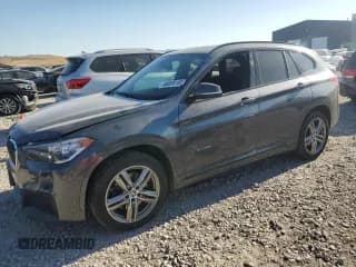 ✅ 2018 BMW X1 xDrive28i • VIN: WBXHT3C35J5F88165 • Lot: 66009165. Wystawiony na Copart z przebiegiem 87 077 mil. Bezpłatny archiwum sprzedaży aukcyjnych z USA i szczegółowy raport historii pojazdu na DreamBid. Zdjęcie 1.