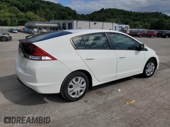 ✅ 2013 Honda Insight • VIN: JHMZE2H37DS004350 • Лот: 68494834. Опубликован ранее на Copart с пробегом 87 209 миль. Бесплатный доступ к архиву аукционных продаж из США и подробный отчёт об истории автомобиля на DreamBid. Изображение 3.