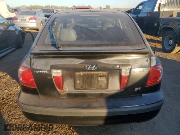 2004 Hyundai Elantra GT z VIN KMHDN56D84U108029, wystawiony jako Copart lot #76633414 z przebiegiem 105 315 mil mil oraz Czysty tytuł • Clean title. Historia ofert i sprzedaży dostępna na DreamBid. Obrazek 6.