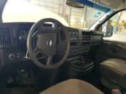 ✅ 2014 Chevrolet Express Passenger LT • VIN: 1GAZG1FG7E1167317 • Lot: 87405485. Listed on Copart with 212,748 mi. Free auction sales archive from the USA and detailed vehicle history report at DreamBid. Image 8.