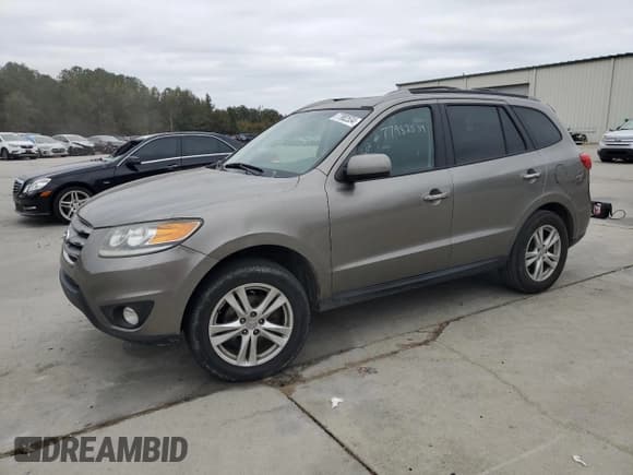 ✅ 2012 Hyundai Santa Fe Limited • VIN: 5XYZK3AB8CG143621 • Lot: 77982534. Listed on Copart with 130,010 mi. Free auction sales archive from the USA and detailed vehicle history report at DreamBid. Image 1.