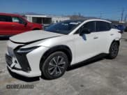 ✅ 2023 Lexus RZ 450e Premium • VIN: JTJAAAAB8PA006136 • Lot: 69795995. Listed on Copart with 31,942 mi. Free auction sales archive from the USA and detailed vehicle history report at DreamBid. Image 1.