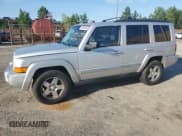 ✅ 2010 Jeep Commander Sport • VIN: 1J4RG4GK4AC125711 • Lot: 60369545. Listed on Copart with 209,522 mi. Free auction sales archive from the USA and detailed vehicle history report at DreamBid. Image 1.