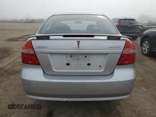 ✅ 2008 Pontiac Wave • VIN: KL2TD55618B059282 • Лот: 60112015. Опубликован ранее на Copart с пробегом 89 678 миль. Бесплатный доступ к архиву аукционных продаж из США и подробный отчёт об истории автомобиля на DreamBid. Изображение 6.