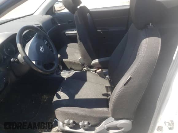 2007 Hyundai Accent GS with VIN KMHCM36C27U030166, listed as a Copart auction lot 67738154 with 174,856 mi miles and Salvage title. Bid and sale history available at DreamBid. Image 7.