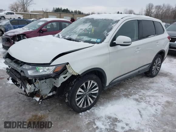 2020 Mitsubishi Outlander ES with VIN JA4AZ3A33LZ011380, listed as a IAAI auction lot 41567914 with 72,663 mi miles and . Bid and sale history available at DreamBid. Image 2.