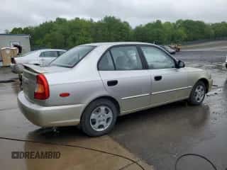2002 Hyundai Accent GL with VIN KMHCG45C12U355561, listed as a Copart auction lot 54546945 with 22,893 mi miles and Salvage title. Bid and sale history available at DreamBid. Image 3.