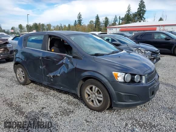 2013 Chevrolet Sonic LT with VIN 1G1JC6SG2D4148084, listed as a IAAI auction lot 43459236 with 94,963 mi miles and . Bid and sale history available at DreamBid. Image 1.