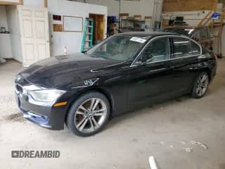 2015 BMW 3 Series 335i xDrive with VIN WBA3B9C56FP705448, listed as a Copart auction lot 64601185 with 137,791 mi miles and Salvage title. Bid and sale history available at DreamBid. Image 1.