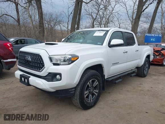 ✅ 2018 Toyota Tacoma SR5 • VIN: 3TMDZ5BN9JM051105 • Lot: 41708034. Wystawiony na IAAI z przebiegiem 98 000 mil. Bezpłatny archiwum sprzedaży aukcyjnych z USA i szczegółowy raport historii pojazdu na DreamBid. Zdjęcie 2.