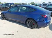 ✅ 2025 Tesla Model 3 Performance • VIN: 5YJ3E1ET3SF971313 • Lot: 42900442. Listed on IAAI with 2,881 mi. Free auction sales archive from the USA and detailed vehicle history report at DreamBid. Image 3.