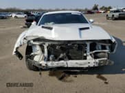 ✅ 2016 Dodge Challenger SXT Plus • VIN: 2C3CDZAG4GH300474 • Lot: 71741622. Wystawiony na Copart z przebiegiem 72 819 mil. Bezpłatny archiwum sprzedaży aukcyjnych z USA i szczegółowy raport historii pojazdu na DreamBid. Zdjęcie 5.