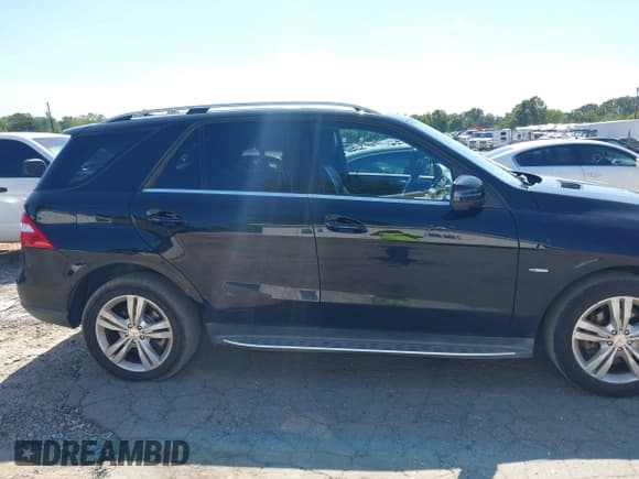 ✅ 2012 Mercedes-Benz M 350 • VIN: 4JGDA5HB7CA023030 • Lot: 43186539. Listed on IAAI with 210,050 mi. Free auction sales archive from the USA and detailed vehicle history report at DreamBid. Image 14.