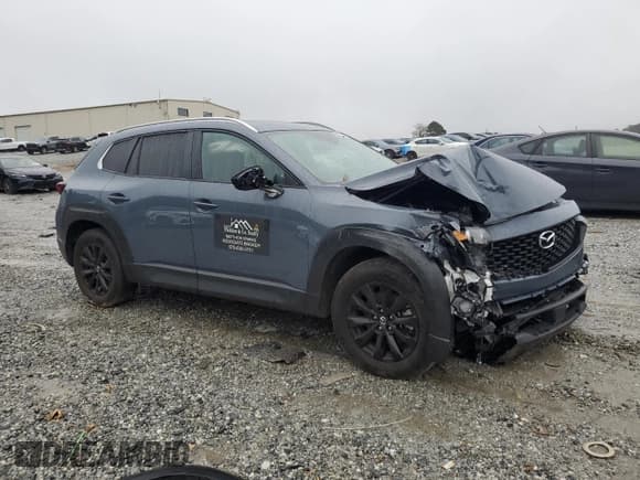 ✅ 2023 Mazda CX-50 S Preferred Plus • VIN: 7MMVABCM9PN112757 • Lot: 90320495. Listed on Copart with 57,072 mi. Free auction sales archive from the USA and detailed vehicle history report at DreamBid. Image 4.