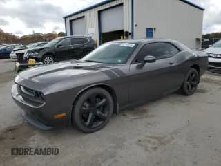 ✅ 2014 Dodge Challenger SXT Plus • VIN: 2C3CDYAG7EH195727 • Лот: 82740035. Опубликован ранее на Copart с пробегом 174 876 миль. Бесплатный доступ к архиву аукционных продаж из США и подробный отчёт об истории автомобиля на DreamBid. Изображение 1.