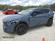✅ 2023 Mazda CX-5 S Preferred • VIN: JM3KFBCM1P0163968 • Lot: 87231515. Listed on Copart with 34,092 mi. Free auction sales archive from the USA and detailed vehicle history report at DreamBid. Image 1.