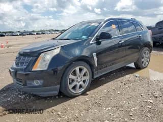 ✅ 2012 Cadillac SRX Premium Collection • VIN: 3GYFNCE39CS504375 • Лот: 89707115. Опубликован ранее на Copart с пробегом Не указан. Бесплатный доступ к архиву аукционных продаж из США и подробный отчёт об истории автомобиля на DreamBid. Изображение 1.