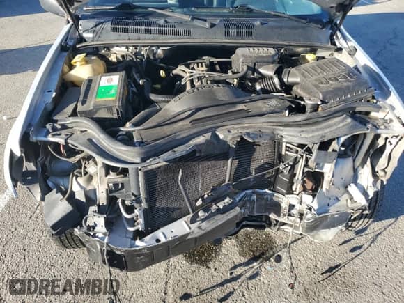 2004 Jeep Grand Cherokee Laredo с VIN 1J4GX48S54C385240, выставлен на аукционе Copart как лот 86716575 с пробегом 131 190 миль миль и Списание • Salvage title. История ставок и продаж доступна на DreamBid. Изображение 11.