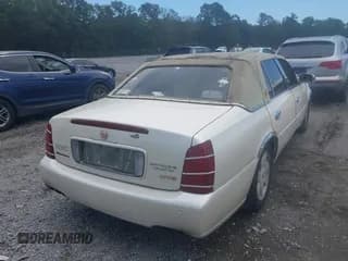 ✅ 2003 Cadillac DeVille DTS • VIN: 1G6KF57973U124663 • Lot: 43042100. Wystawiony na IAAI z przebiegiem 192 073 mil. Bezpłatny archiwum sprzedaży aukcyjnych z USA i szczegółowy raport historii pojazdu na DreamBid. Zdjęcie 4.