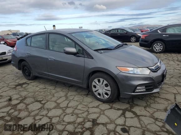 ✅ 2012 Honda Insight • VIN: JHMZE2H34CS005390 • Lot: 82239245. Listed on Copart with 104,017 mi. Free auction sales archive from the USA and detailed vehicle history report at DreamBid. Image 4.