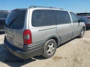 ✅ 2005 Pontiac Montana 1SA • VIN: 1GMDV23EX5D147329 • Lot: 43090912. Listed on IAAI with 177,600 mi. Free auction sales archive from the USA and detailed vehicle history report at DreamBid. Image 4.