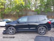 ✅ 2021 Honda Passport EX-L • VIN: 5FNYF8H57MB022083 • Lot: 42399294. Listed on IAAI with 61,014 mi. Free auction sales archive from the USA and detailed vehicle history report at DreamBid. Image 15.