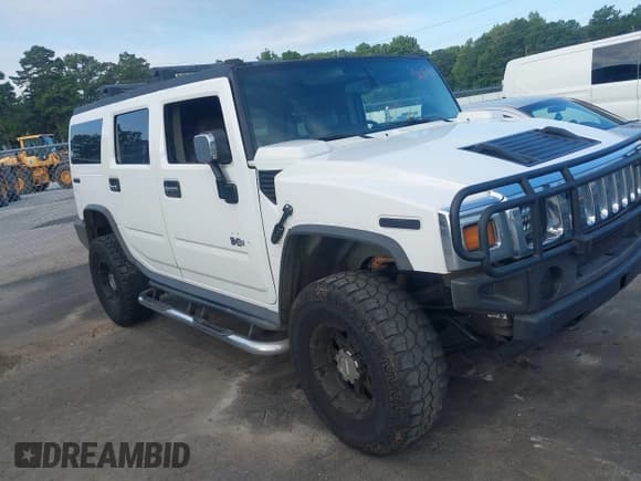 ✅ 2003 Hummer H2 • VIN: 5GRGN23U63H136857 • Lot: 42832921. Listed on IAAI with 255,833 mi. Free auction sales archive from the USA and detailed vehicle history report at DreamBid. Image 1.