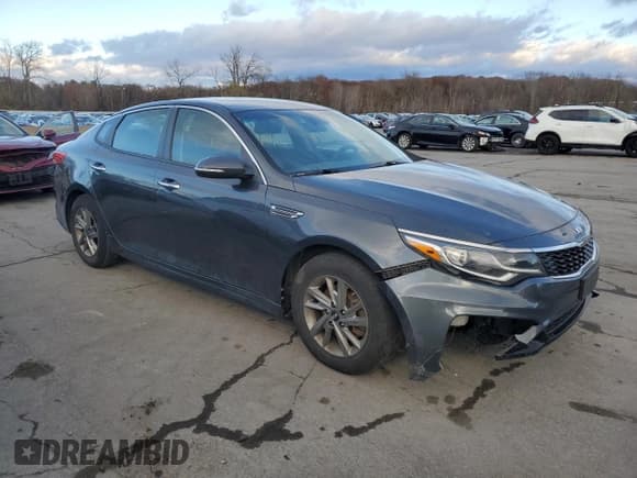 ✅ 2019 Kia Optima S • VIN: 5XXGT4L38KG377387 • Лот: 90328595. Опубликован ранее на Copart с пробегом 92 338 миль. Бесплатный доступ к архиву аукционных продаж из США и подробный отчёт об истории автомобиля на DreamBid. Изображение 4.