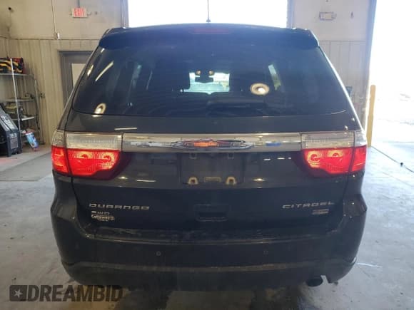 ✅ 2013 Dodge Durango Citadel • VIN: 1C4RDJEG0DC674967 • Lot: 90258325. Listed on Copart with 176,266 mi. Free auction sales archive from the USA and detailed vehicle history report at DreamBid. Image 6.