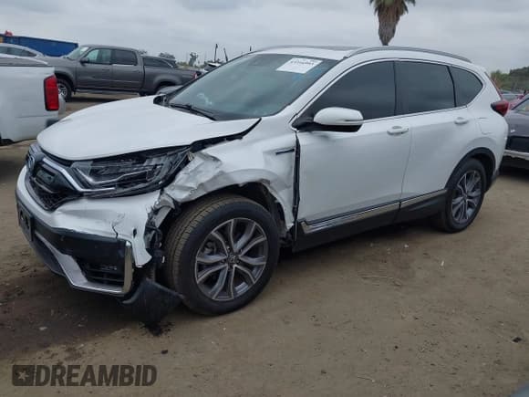 ✅ 2022 Honda CR-V Touring • VIN: 5J6RT6H95NL043897 • Lot: 43316993. Listed on IAAI with 154,584 mi. Free auction sales archive from the USA and detailed vehicle history report at DreamBid. Image 2.