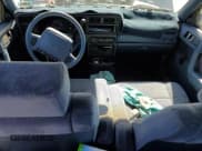 ✅ 1993 Dodge Spirit • VIN: 1B3XA46K0PF638477 • Lot: 75710534. Listed on Copart with 50,637 mi. Free auction sales archive from the USA and detailed vehicle history report at DreamBid. Image 8.