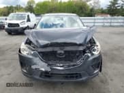 ✅ 2014 Mazda CX-5 Sport • VIN: JM3KE2BE5E0311095 • Lot: 56219775. Listed on Copart with 131,060 mi. Free auction sales archive from the USA and detailed vehicle history report at DreamBid. Image 5.