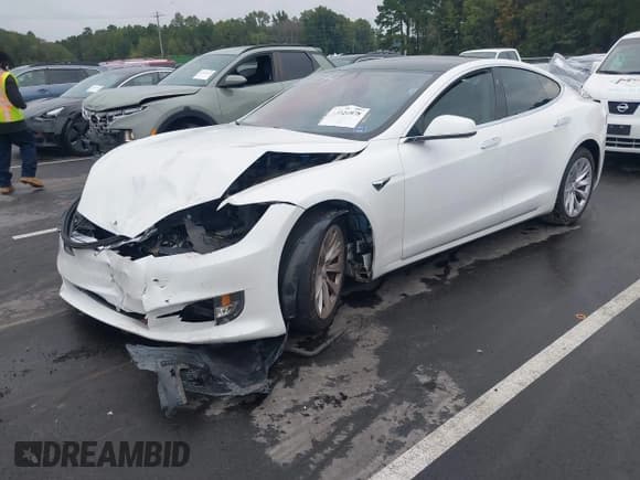 ✅ 2017 Tesla Model S 60 • VIN: 5YJSA1E16HF178893 • Lot: 43320978. Listed on IAAI with 100,290 mi. Free auction sales archive from the USA and detailed vehicle history report at DreamBid. Image 2.