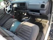 ✅ 1999 Dodge Dakota Sport • VIN: 1B7FL26P3XS274714 • Lot: 56547535. Wystawiony na Copart z przebiegiem 150 818 mil. Bezpłatny archiwum sprzedaży aukcyjnych z USA i szczegółowy raport historii pojazdu na DreamBid. Zdjęcie 8.