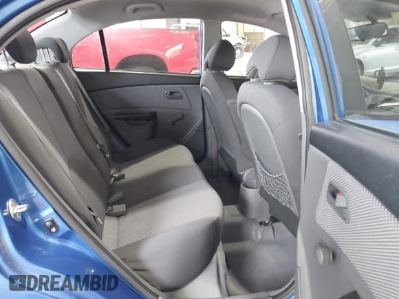 ✅ 2010 Kia Rio LX • VIN: KNADH4A37A6652068 • Lot: 42985384. Listed on IAAI with 72,837 mi. Free auction sales archive from the USA and detailed vehicle history report at DreamBid. Image 8.