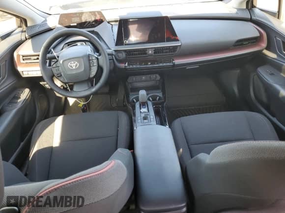 2025 Toyota Prius SE с VIN JTDACACU9S3049067, выставлен на аукционе Copart как лот 67230145 с пробегом 1 461 миль миль и Списание • Salvage title. История ставок и продаж доступна на DreamBid. Изображение 8.