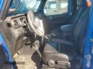 ✅ 2023 Jeep Wrangler Sahara • VIN: 1C4HJXEN4PW667027 • Лот: 84585385. Опубликован ранее на Copart с пробегом 25 751 миль. Бесплатный доступ к архиву аукционных продаж из США и подробный отчёт об истории автомобиля на DreamBid. Изображение 7.