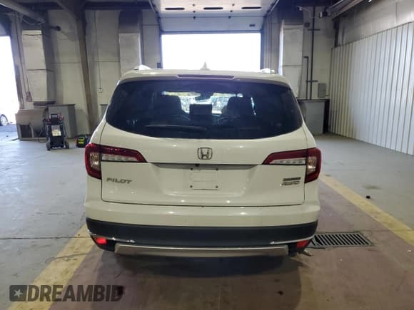 ✅ 2022 Honda Pilot Touring 7-Passenger • VIN: 5FNYF6H69NB029700 • Lot: 86212445. Listed on Copart with Not provided. Free auction sales archive from the USA and detailed vehicle history report at DreamBid. Image 6.