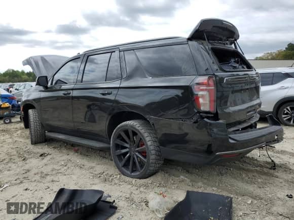 2022 Chevrolet Tahoe RST with VIN 1GNSKRKD0NR338287, listed as a Copart auction lot 53679345 with 59,010 mi miles and Salvage title. Bid and sale history available at DreamBid. Image 2.