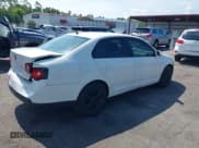 ✅ 2010 Volkswagen Jetta Limited Edition • VIN: 3VWAX7AJXAM110811 • Lot: 42767439. Listed on IAAI with 215,293 mi. Free auction sales archive from the USA and detailed vehicle history report at DreamBid. Image 4.