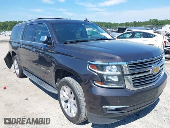 2017 Chevrolet Suburban Premier with VIN 1GNSKJKC1HR403063, listed as a IAAI auction lot 43092501 with 163,931 mi miles and . Bid and sale history available at DreamBid. Image 1.