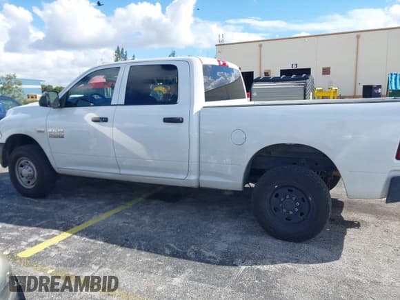 ✅ 2018 Ram 2500 Tradesman • VIN: 3C6UR4CJ4JG306531 • Лот: 43385982. Опубликован ранее на IAAI с пробегом 202 014 миль. Бесплатный доступ к архиву аукционных продаж из США и подробный отчёт об истории автомобиля на DreamBid. Изображение 14.