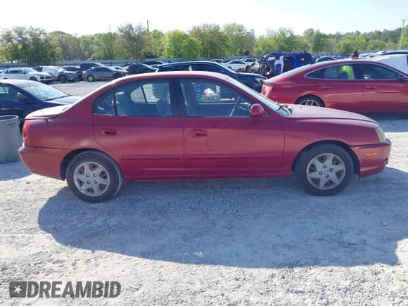 ✅ 2004 Hyundai Elantra GLS • VIN: KMHDN46D94U733209 • Lot: 42001669. Listed on IAAI with Not provided. Free auction sales archive from the USA and detailed vehicle history report at DreamBid. Image 13.