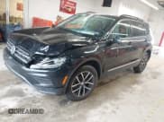 ✅ 2021 Volkswagen Tiguan SE • VIN: 3VV2B7AX2MM096399 • Lot: 42247061. Wystawiony na IAAI z przebiegiem 54 273 mil. Bezpłatny archiwum sprzedaży aukcyjnych z USA i szczegółowy raport historii pojazdu na DreamBid. Zdjęcie 2.