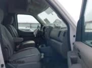 ✅ 2021 Nissan NV Cargo S • VIN: 1N6BF0LY8MN809146 • Lot: 42005532. Listed on IAAI with 31,869 mi. Free auction sales archive from the USA and detailed vehicle history report at DreamBid. Image 5.