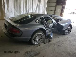 ✅ 2000 Dodge Viper GTS • VIN: 1B3ER69EXYV606564 • Lot: 63698564. Listed on Copart with 15,056 mi. Free auction sales archive from the USA and detailed vehicle history report at DreamBid. Image 3.